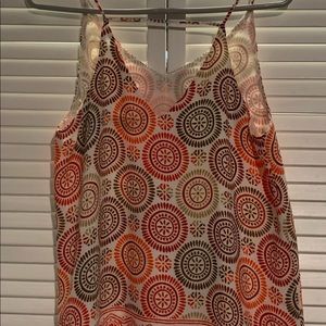 LOFT.  Women’s medium top with spaghetti straps.  With multi colored Circles.
